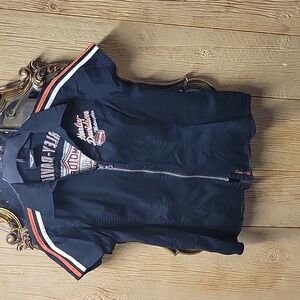 Black Harley Davidson vest.  Size large.